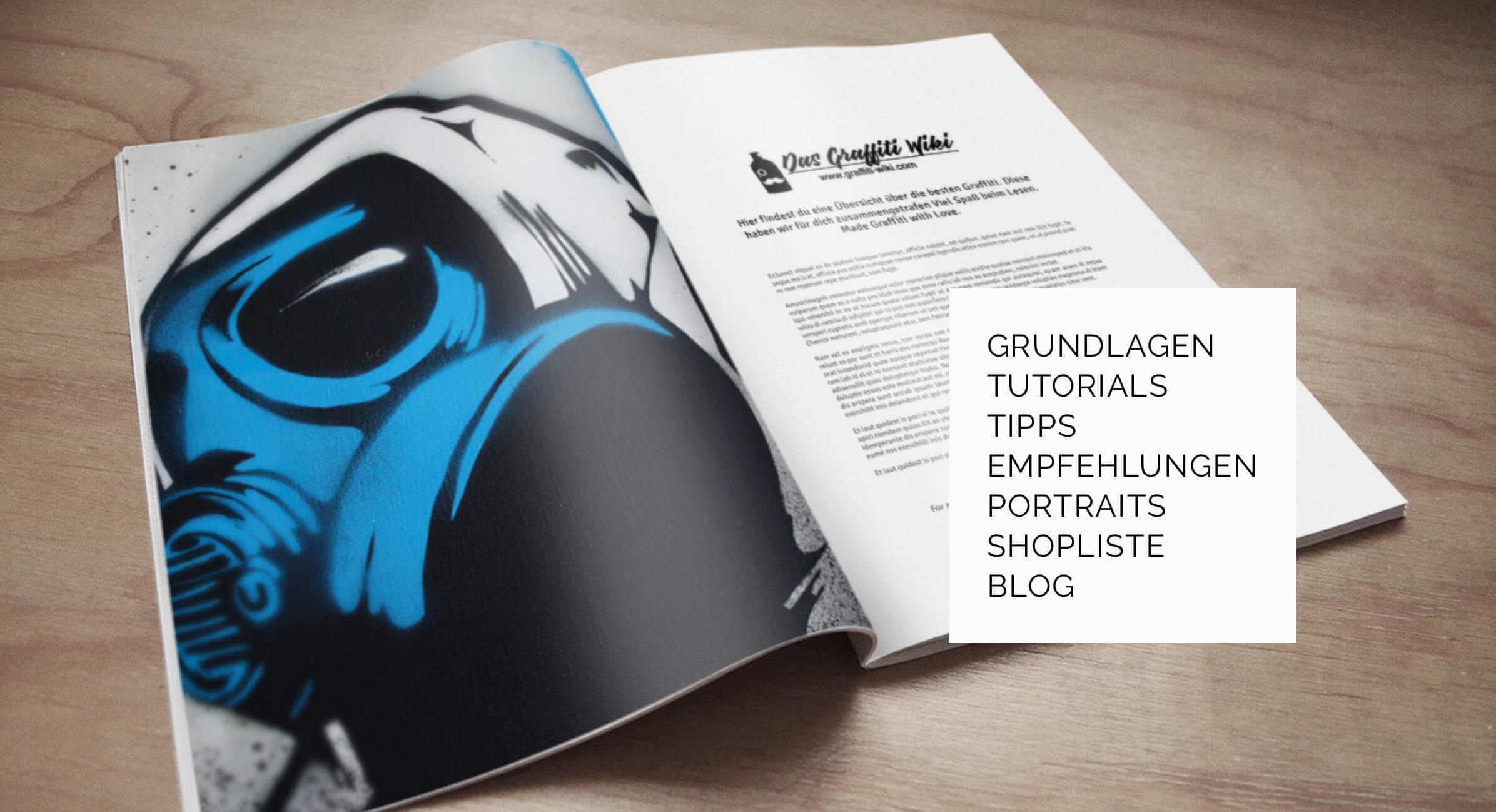 Graffiti-Wiki - Buch aufgeschlagen auf einem Tisch